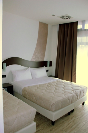 Imagen de la habitación del Hotel Luxor Florence. Foto 9