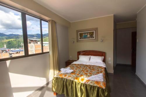 Imagen de la habitación del Hotel Luxor - La Merced. Foto 18