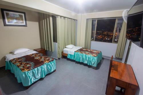 Imagen de la habitación del Hotel Luxor - La Merced. Foto 20