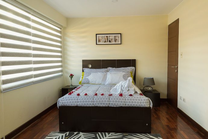 Imagen de la habitación del Hotel Luxstone Executive Suites. Foto 2