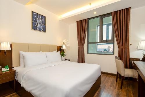 Imagen de la habitación del Hotel Luxtery. Foto 6