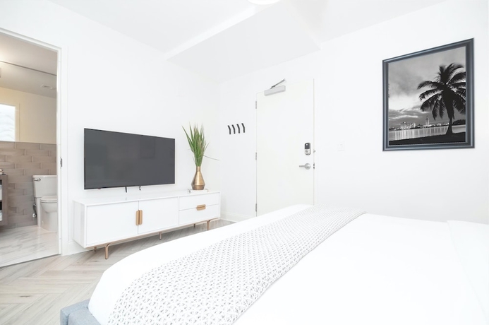 Imagen de la habitación del Hotel Luxuri Suites. Foto 11