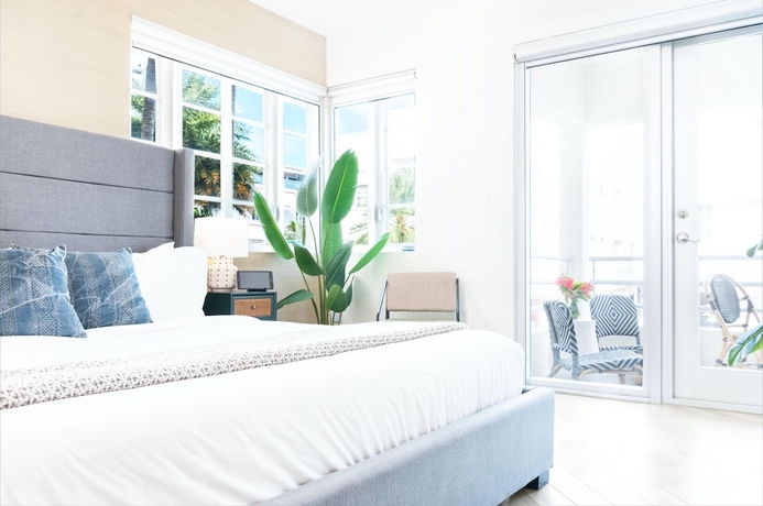 Imagen de la habitación del Hotel Luxuri Suites. Foto 12