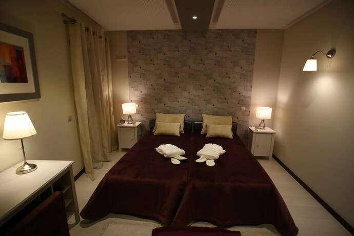 Imagen de la habitación del Hotel Luxury Guest House Opus One. Foto 12