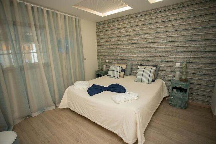 Imagen de la habitación del Hotel Luxury Guest House Opus One. Foto 14