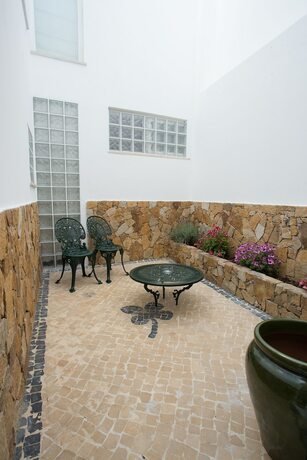 Imagen de la habitación del Hotel Luxury Guest House Opus One. Foto 18