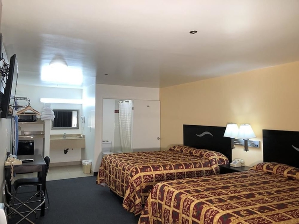Imagen de la habitación del Hotel Luxury Inn, Norwalk. Foto 8