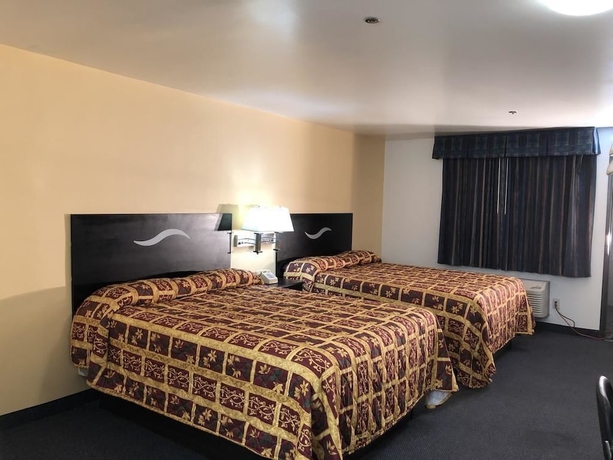 Imagen de la habitación del Hotel Luxury Inn, Norwalk. Foto 9