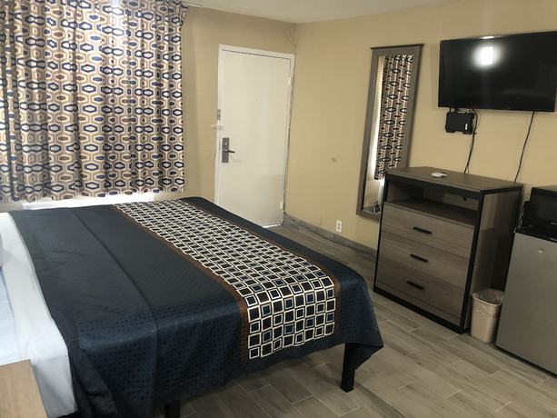 Imagen de la habitación del Hotel Luxury Inn and Suites. Foto 11