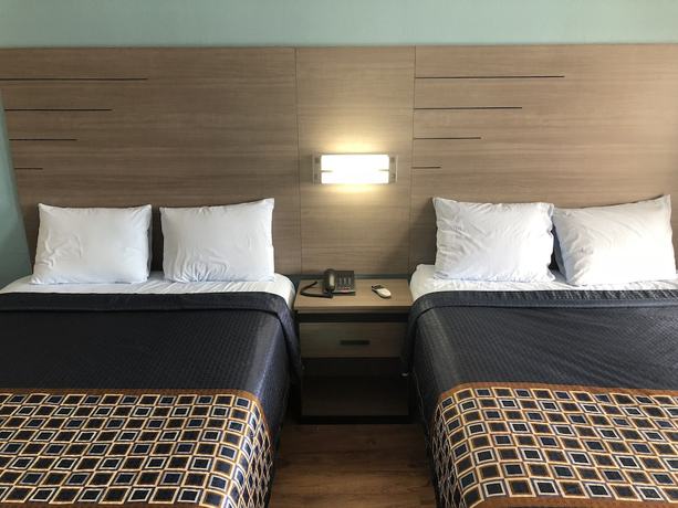 Imagen de la habitación del Hotel Luxury Inn and Suites. Foto 15