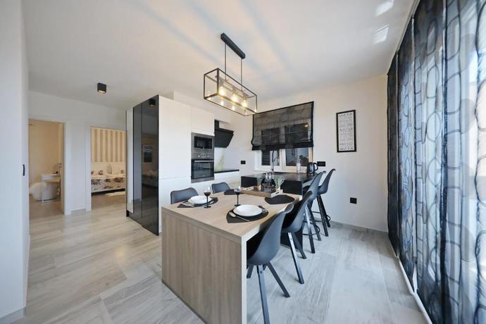 Imagen de la habitación del Hotel Luxury Majpruz Suites. Foto 4