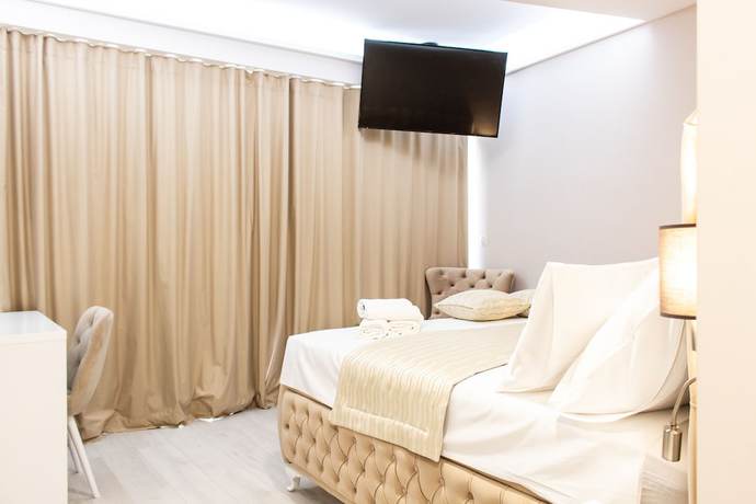 Imagen de la habitación del Hotel Luxury Rooms Seven. Foto 2