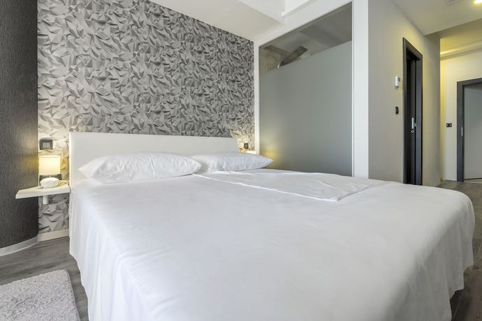Imagen de la habitación del Hotel Luxury Rooms Seven. Foto 4