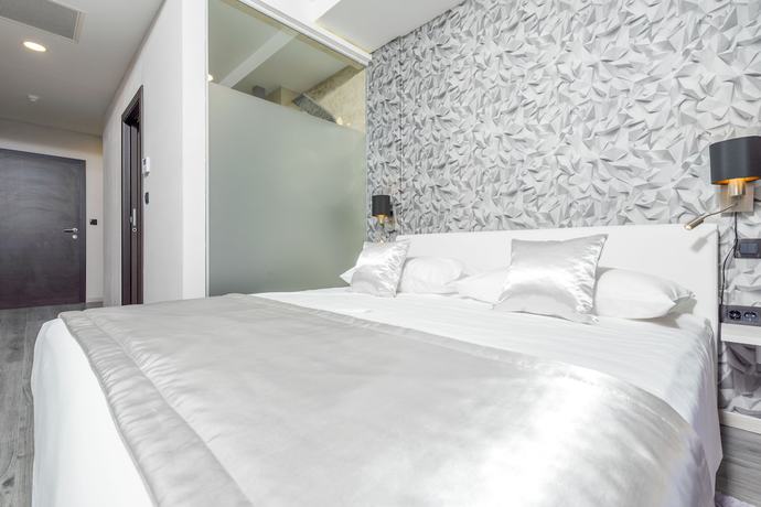 Imagen de la habitación del Hotel Luxury Rooms Seven. Foto 6