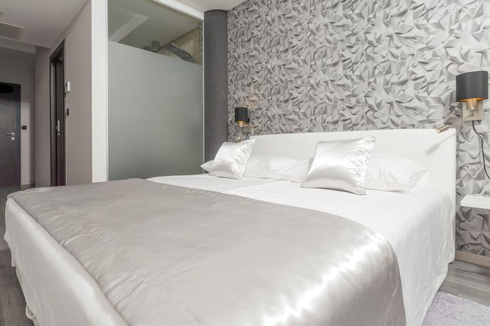 Imagen de la habitación del Hotel Luxury Rooms Seven. Foto 13