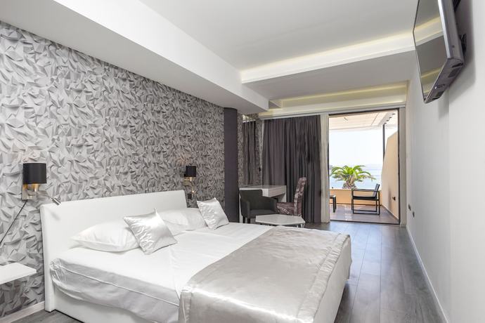 Imagen de la habitación del Hotel Luxury Rooms Seven. Foto 17