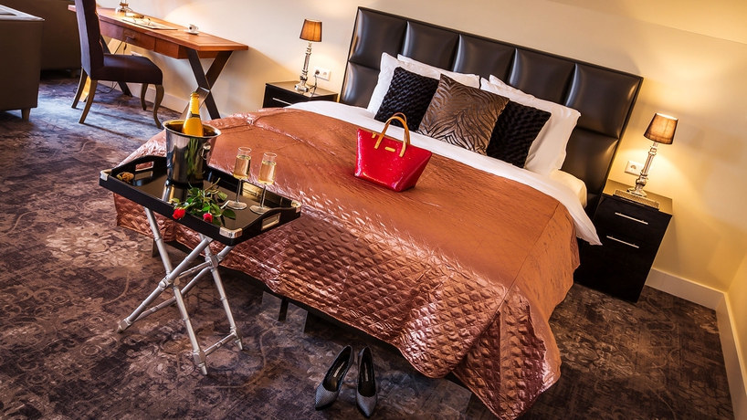 Imagen de la habitación del Hotel Luxury Suites Amsterdam. Foto 10