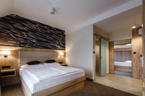 Imagen de la habitación del Hotel Luxury Suites Bellevue. Foto 8