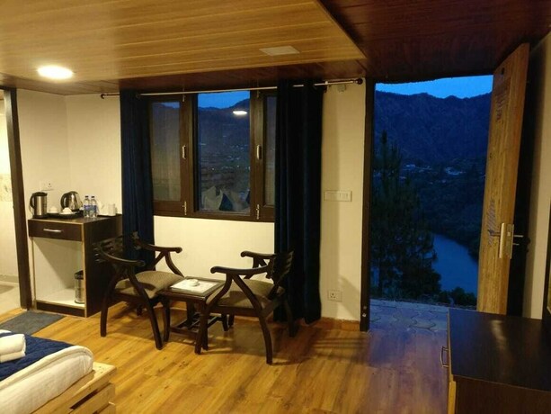Imagen de la habitación del Hotel Luxus Nainital Adventure Park and Resort. Foto 22