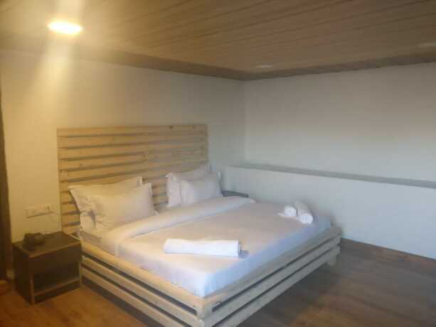 Imagen de la habitación del Hotel Luxus Nainital Adventure Park and Resort. Foto 23