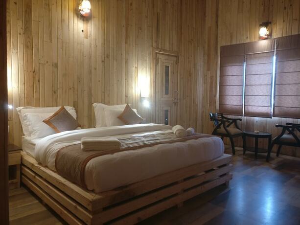 Imagen de la habitación del Hotel Luxus Nainital Adventure Park and Resort. Foto 26