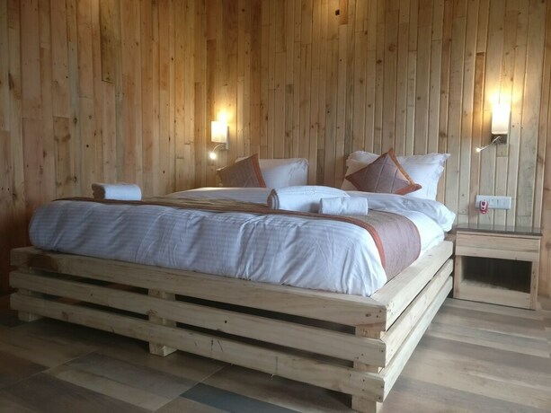 Imagen de la habitación del Hotel Luxus Nainital Adventure Park and Resort. Foto 33