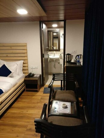 Imagen de la habitación del Hotel Luxus Nainital Adventure Park and Resort. Foto 34
