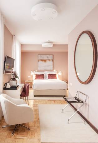 Imagen de la habitación del Hotel Luzeiros Suites. Foto 10