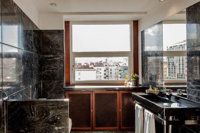 Imagen de la habitación del Hotel Luzeiros Suites. Foto 15