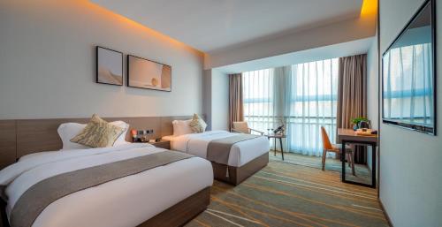 Imagen de la habitación del Hotel Luzhou Baian Smart. Foto 16