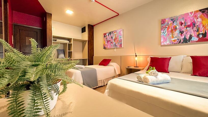 Imagen de la habitación del Hotel Luzzy. Foto 14