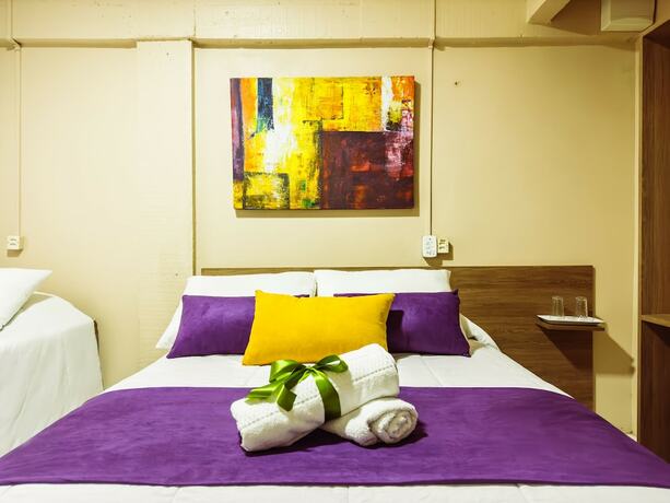 Imagen de la habitación del Hotel Luzzy. Foto 18