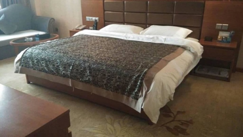 Imagen de la habitación del Hotel Lvbao Jin Hua Hotel. Foto 3