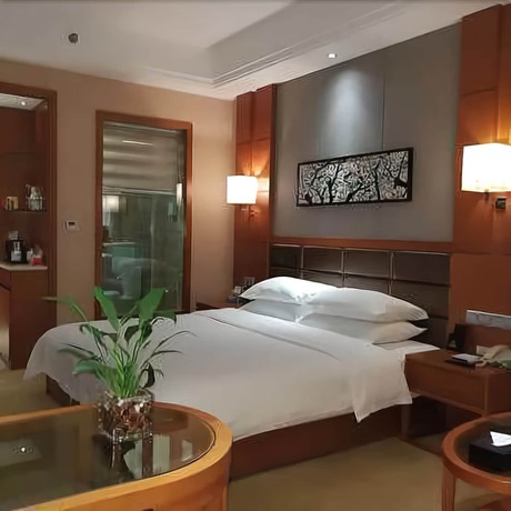 Imagen de la habitación del Hotel Lvbao Jin Hua Hotel. Foto 5