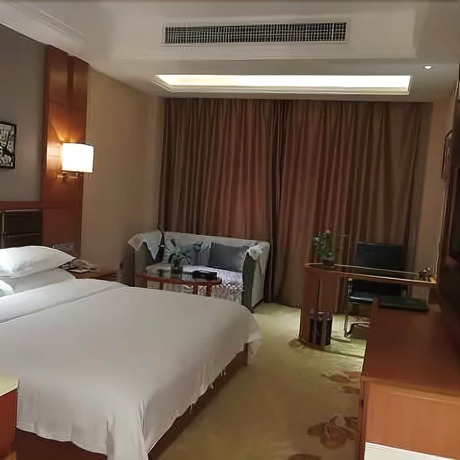 Imagen de la habitación del Hotel Lvbao Jin Hua Hotel. Foto 7