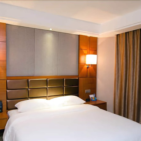 Imagen de la habitación del Hotel Lvbao Jin Hua Hotel. Foto 8