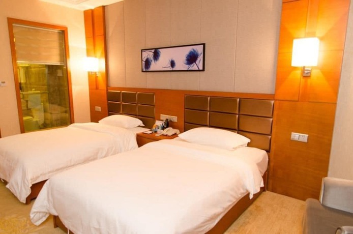 Imagen de la habitación del Hotel Lvbao Jin Hua Hotel. Foto 14