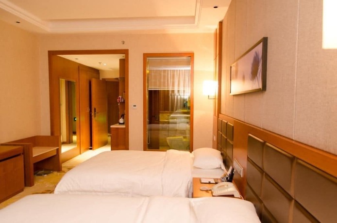 Imagen de la habitación del Hotel Lvbao Jin Hua Hotel. Foto 16