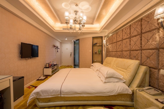 Imagen de la habitación del Hotel Lvgu Yiwu. Foto 4