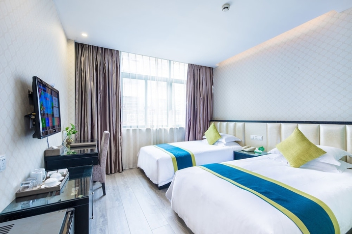 Imagen de la habitación del Hotel Lvgu Yiwu. Foto 6