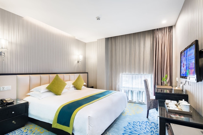 Imagen de la habitación del Hotel Lvgu Yiwu. Foto 7