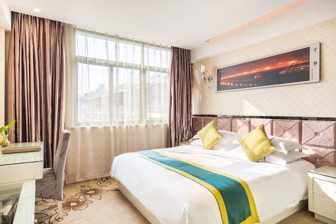 Imagen de la habitación del Hotel Lvgu Yiwu. Foto 8