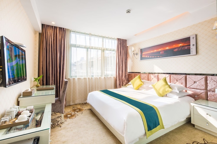 Imagen de la habitación del Hotel Lvgu Yiwu. Foto 9