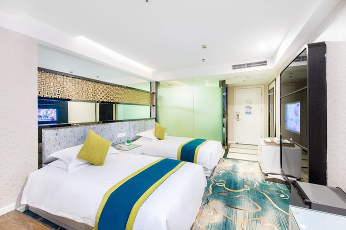 Imagen de la habitación del Hotel Lvgu Yiwu. Foto 11