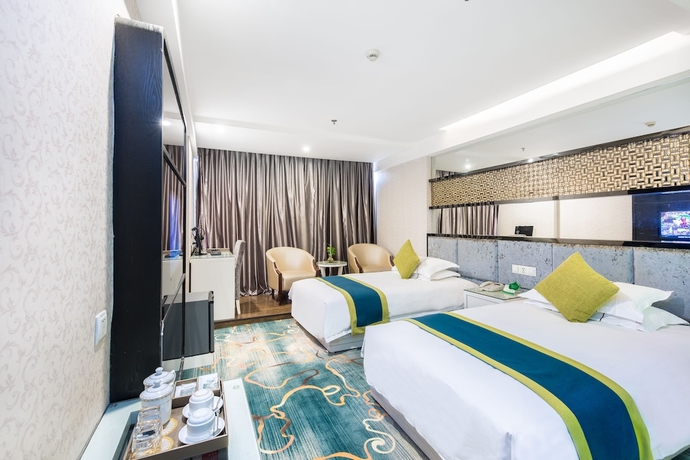 Imagen de la habitación del Hotel Lvgu Yiwu. Foto 12