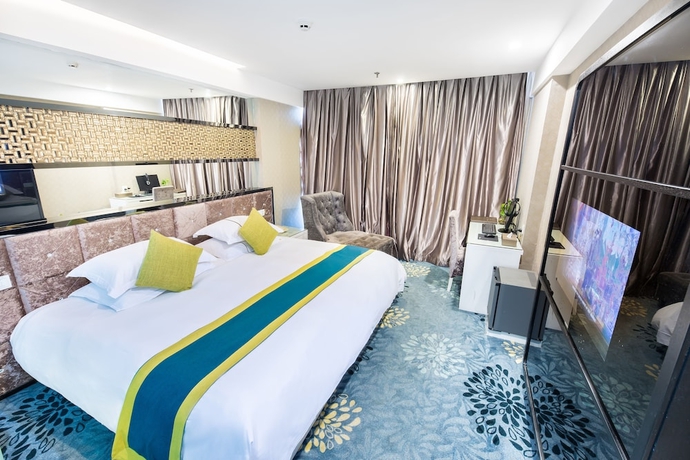 Imagen de la habitación del Hotel Lvgu Yiwu. Foto 13