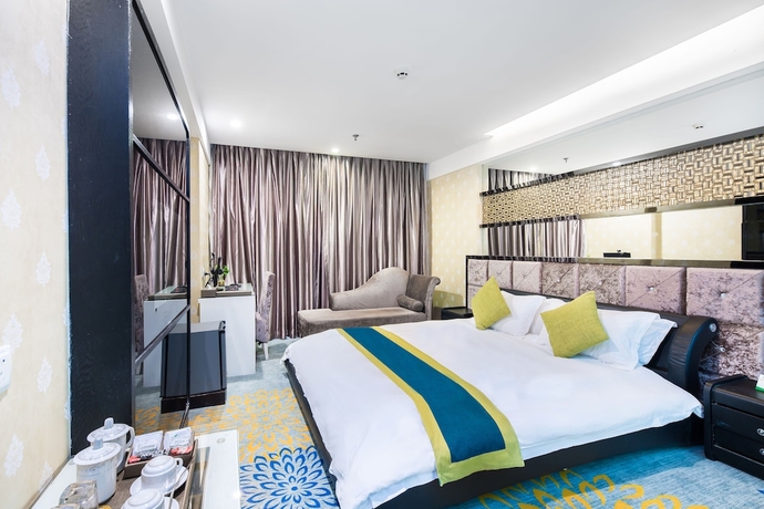 Imagen de la habitación del Hotel Lvgu Yiwu. Foto 14