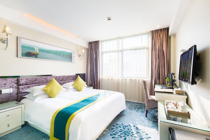 Imagen de la habitación del Hotel Lvgu Yiwu. Foto 16