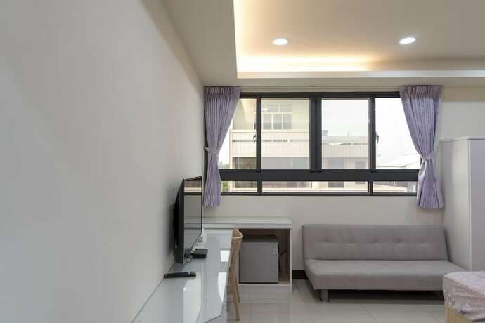 Imagen de la habitación del Hotel Lvyou BandB. Foto 15