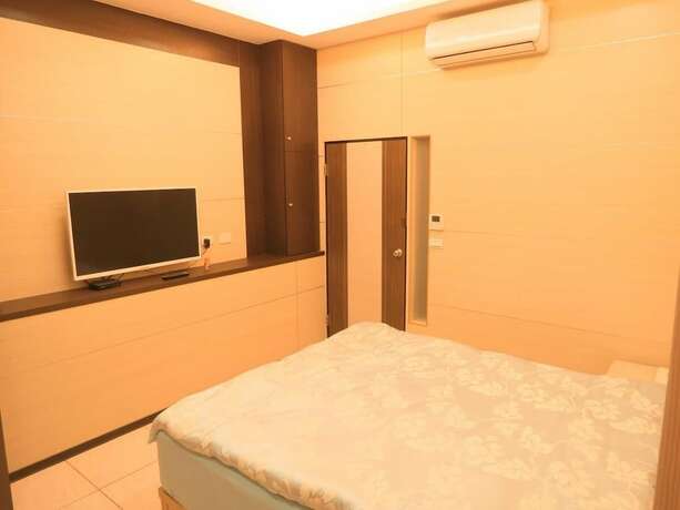 Imagen de la habitación del Hotel Lvyou BandB. Foto 17
